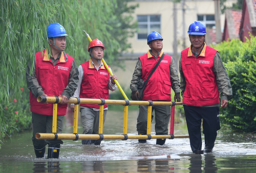 趕考爭先架心橋——國家電網(wǎng)河北電力共產(chǎn)黨員服務隊發(fā)展紀實